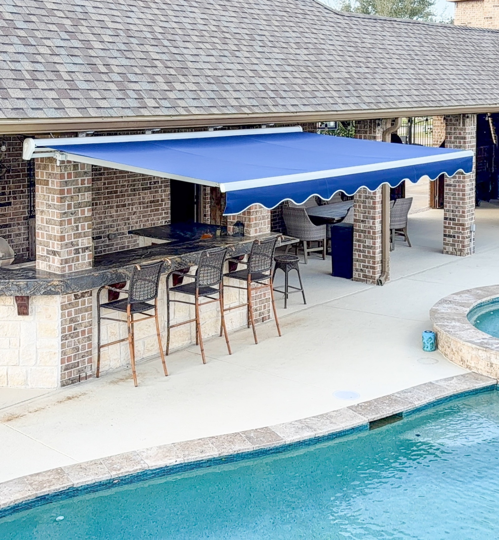 Poolside Outdoor Kitchen Awning installed by Texan Glass in South Houston, TX