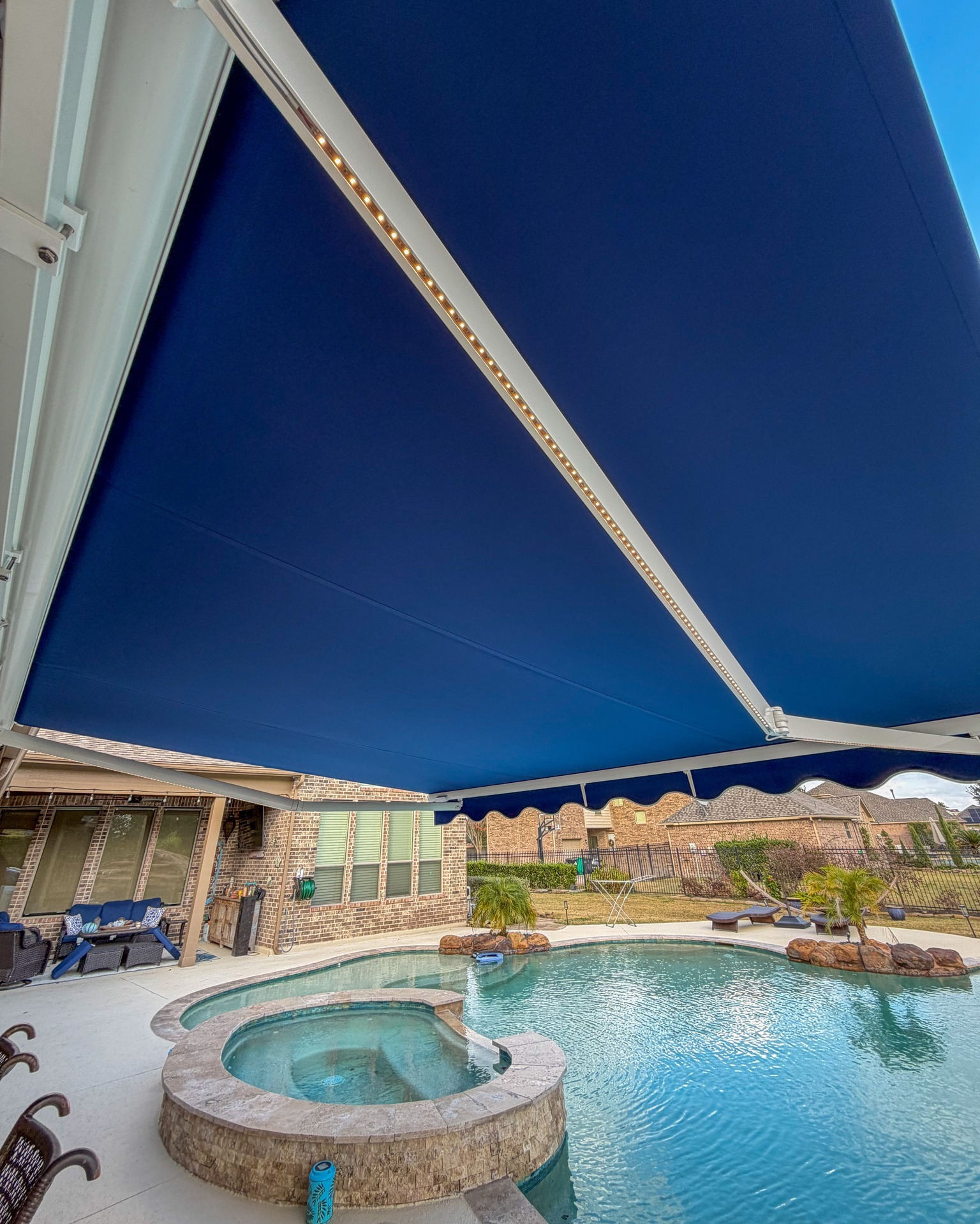 Lighted Retractable Pool Awning installed by Texan Glass in South Houston, TX